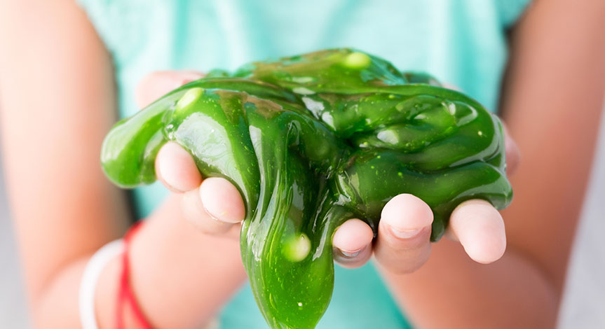 Green Slime oozing from little girls hands